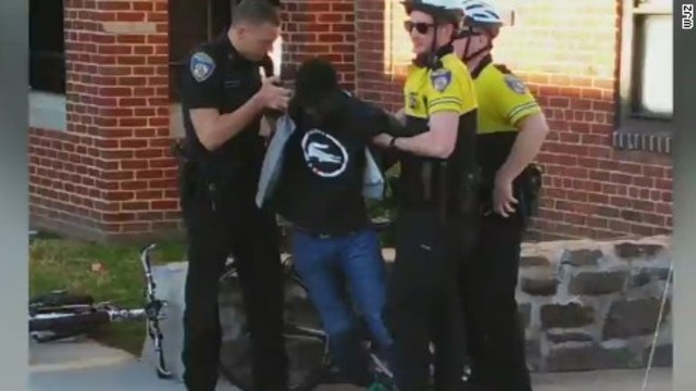Freddie Gray being detained by police for the last time  before his spine was mysteriously severed