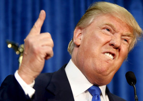 Republican presidential candidate Donald Trump gestures and declares "You're fired!" at a rally in Manchester, New Hampshire, June 17, 2015.  REUTERS/Dominick Reuter      TPX IMAGES OF THE DAY      - RTX1GZCO