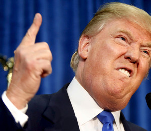 Republican presidential candidate Donald Trump gestures and declares "You're fired!" at a rally in Manchester, New Hampshire, June 17, 2015.  REUTERS/Dominick Reuter      TPX IMAGES OF THE DAY      - RTX1GZCO